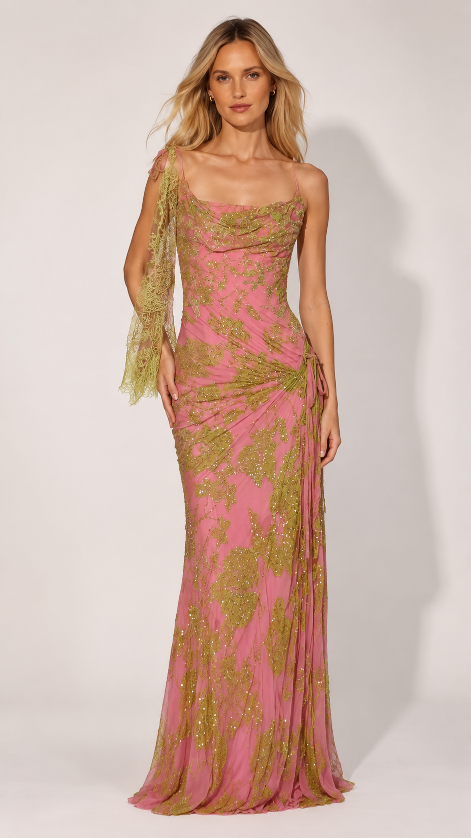Front view of pink glitter mesh cowl neck evening gown with side draping and sheer shoulder scarf