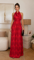 Front view of red halter neck backless maxi evening dress with gathered waist