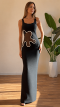 Front view of black square neck maxi dress with contrast-trimmed side cutout