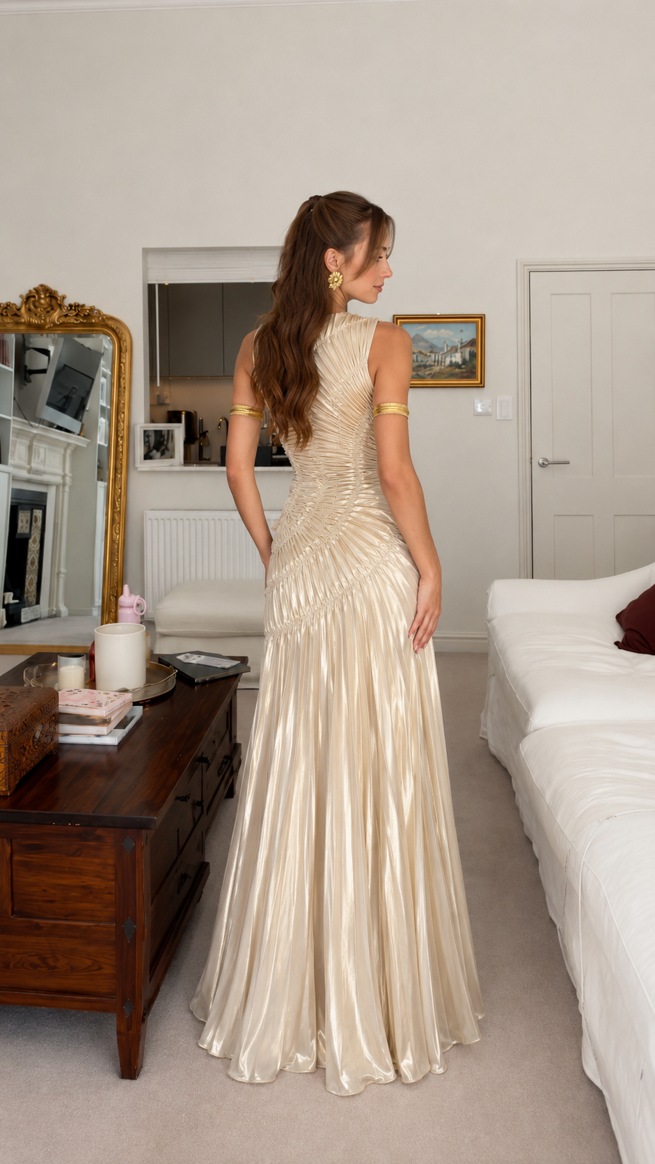Back view of champagne sleeveless floor-length ruched gown