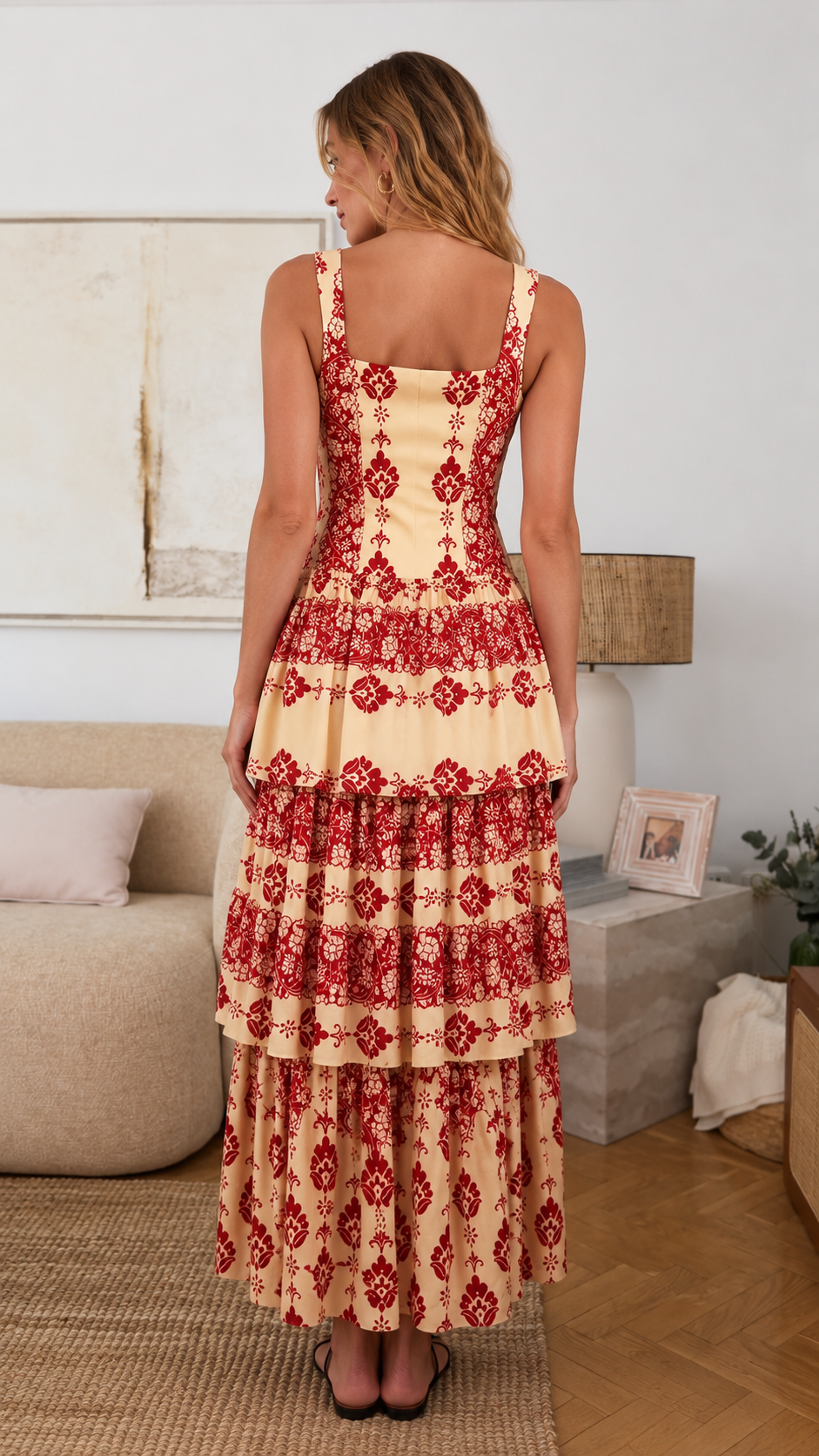 Back view of apricot and red printed maxi dress with wide straps