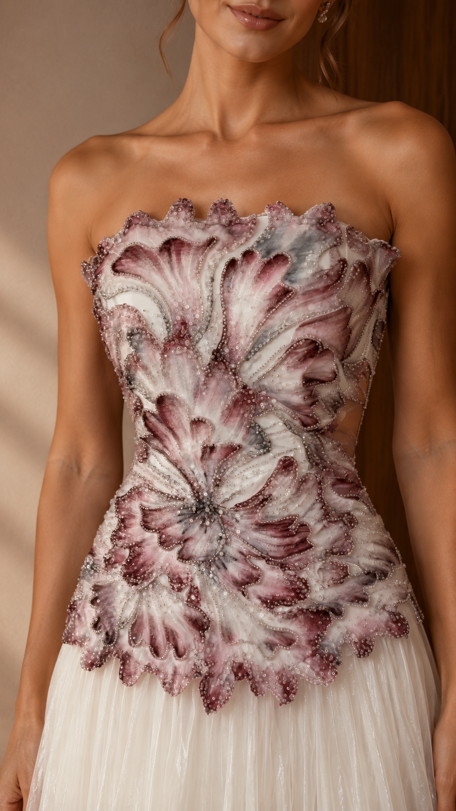 Close-up of mauve floral appliqu¨¦ strapless bodice with scalloped neckline